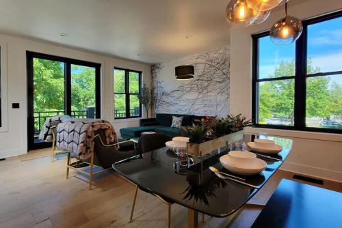 a living room with a couch and a table at Station House Suite A in Jacksonville