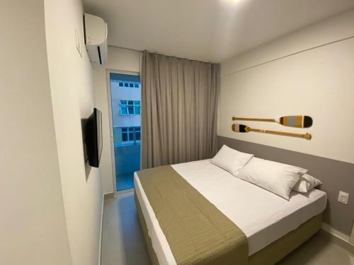 Postel nebo postele na pokoji v ubytování Edifício Promenade II Apt 403 -Mandi Hospitalidade