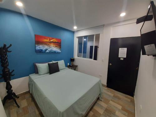 Postel nebo postele na pokoji v ubytování Hotel Sunset Beach