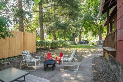 a group of chairs and a table on a patio at 2BR 1BA Small Town Feel Pets Allowed in Spokane