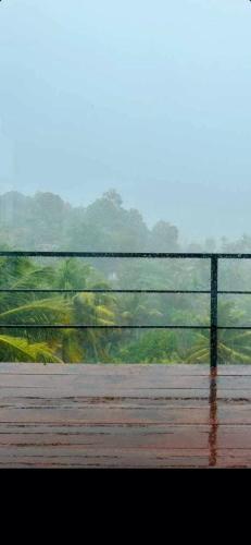 a view from a train window of a tennis court at X Mirissa in Mirissa