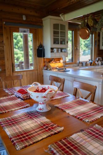 a kitchen with a table with a bowl on it at The Flysch in Miríki