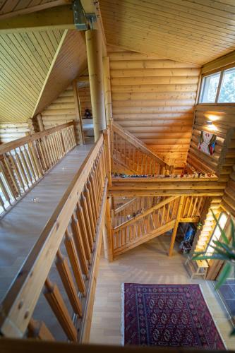 an overhead view of a staircase in a cabin at The Flysch in Miríki