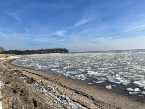 a large body of ice on a beach at Reethäuser auf Rügen in Middelhagen