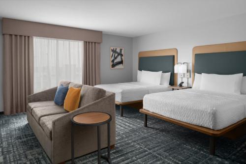 Postel nebo postele na pokoji v ubytování Homewood Suites By Hilton Charlotte Uptown First Ward