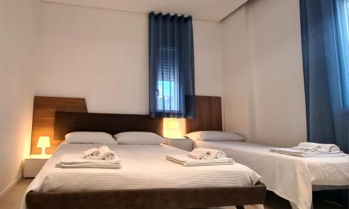 Postel nebo postele na pokoji v ubytování Villa sul mare Dambra Apartment