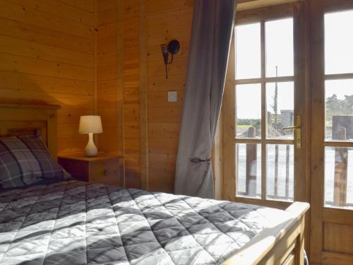 Giường trong phòng chung tại Baytree Lodge - Uk13322