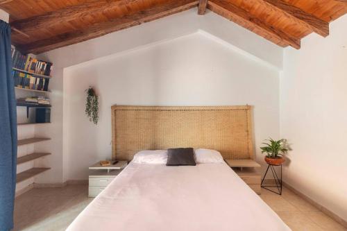 Postel nebo postele na pokoji v ubytování Letto Hostal