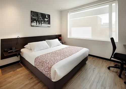 Postel nebo postele na pokoji v ubytování Hotel B3 Virrey