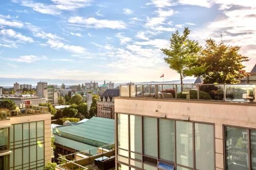 a view of a city from a building at Waterfalls Hotel in Downtown With Stunning Views! in Victoria