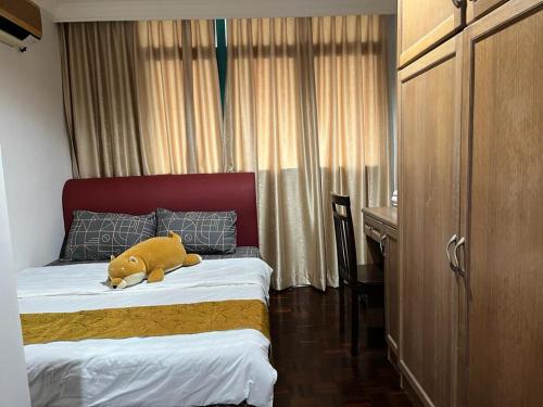 Кровать или кровати в номере Miri City Centre Condo @ Imperial Mall