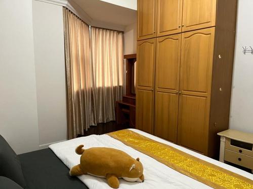 Кровать или кровати в номере Miri City Centre Condo @ Imperial Mall