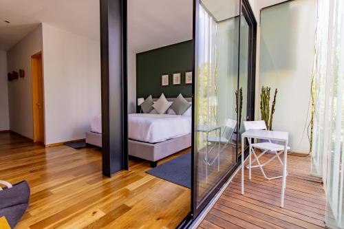 En eller flere senge i et værelse på Capitalia Temistocles Polanco