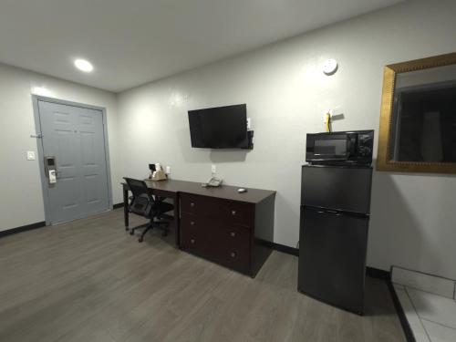 Kuchyň nebo kuchyňský kout v ubytování Relax Inn Mcgehee