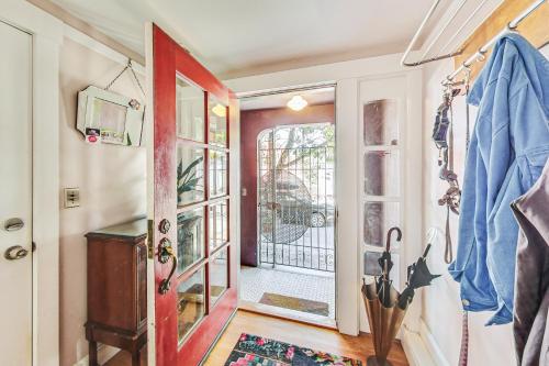 a hallway with a door leading to a balcony at Bernal Heights Spacious 3br Oasis Walk Score 96 in San Francisco