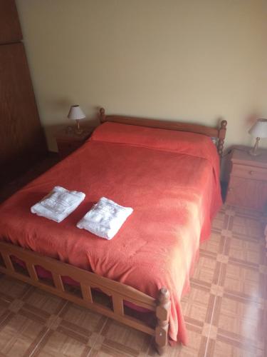 Ένα ή περισσότερα κρεβάτια σε δωμάτιο στο Elena
