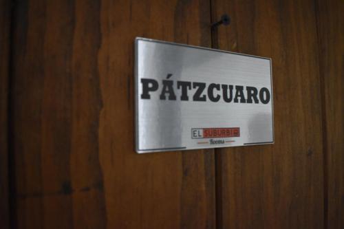Un certificado, premio, letrero u otro documento en El Suburbio - Serapio Rendon