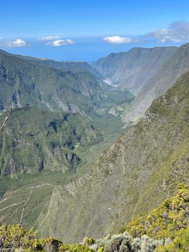 a view of a valley in the mountains at Vulkan’O in La Plaine des Cafres