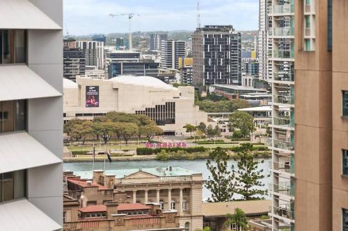 a view of a city from a building at Heart of the CBD ~ 1Bed/1Bath/Balcony/Free Parking in Brisbane