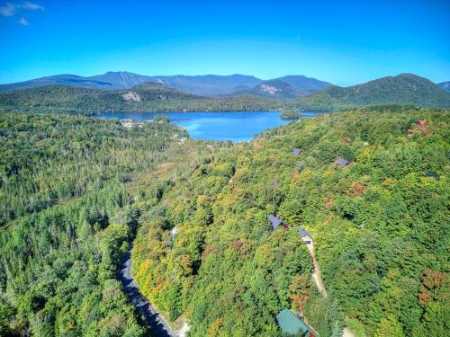an aerial view of a river in a forest at Tremblant chalet O-Spa in Lac-Superieur