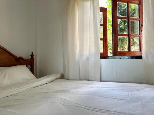 Ένα ή περισσότερα κρεβάτια σε δωμάτιο στο Beachfront house in Chaloklum