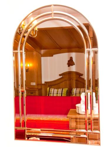 an archway in a room with a bed at Adlerhorst , Gstan 31 in Finkenberg