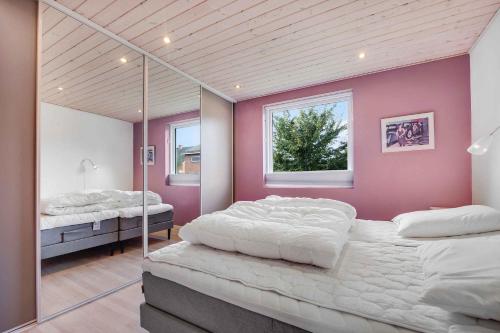 Ένα ή περισσότερα κρεβάτια σε δωμάτιο στο Nrregade 18, 9600 Aars