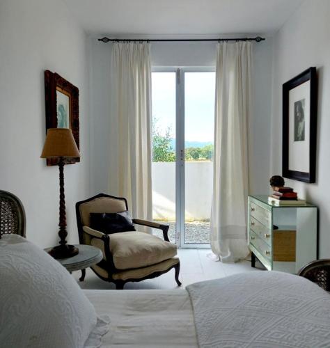 Ένα ή περισσότερα κρεβάτια σε δωμάτιο στο The White House Homestay