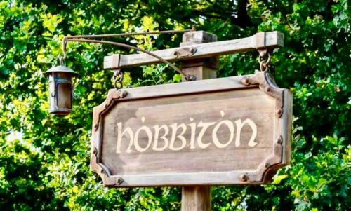 a sign for a roeboren with a light on it at 2 Bedroom Home away from Home near CBD & private parking in Hamilton