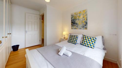 Ένα ή περισσότερα κρεβάτια σε δωμάτιο στο Charming 5-Bed House in Grays