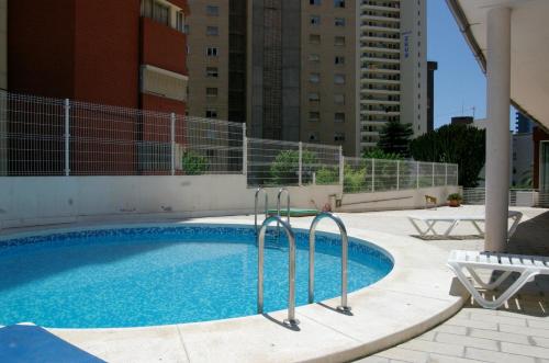 Swimmingpoolen hos eller tæt på Apartamentos Les Dunes Centro