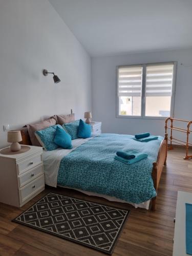 Postel nebo postele na pokoji v ubytování Gîte Chez Gladys