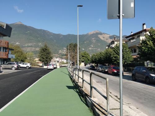 a green sidewalk on the side of a street at Appartamento relax Svitlana in Castel di Sangro