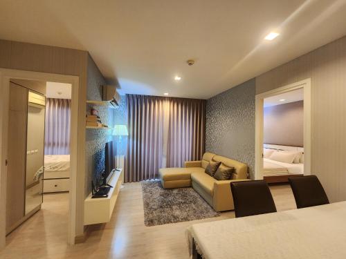 Postel nebo postele na pokoji v ubytování Family Suit 2 Bedrooms 2 Bathrooms in Chiang Mai