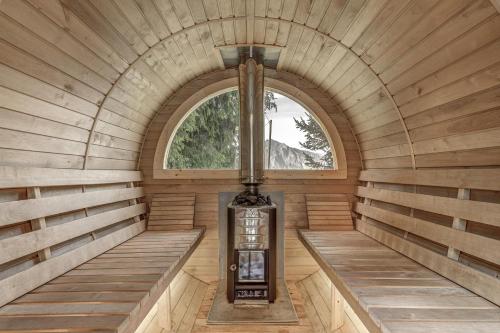an inside view of a sauna with a window at Chalet les Bubus in La Tzoumaz