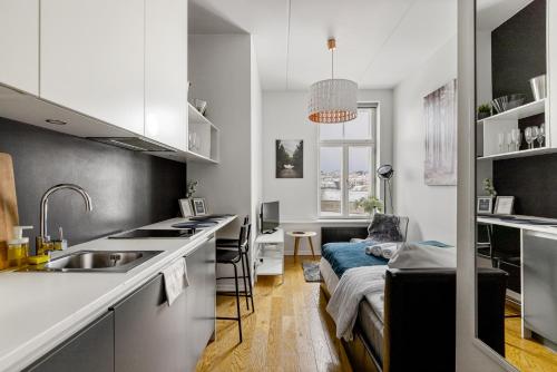 Kuchyň nebo kuchyňský kout v ubytování Dream Stay - Mere Residence Apartments with 24H reception