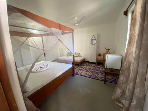 Кровать или кровати в номере Villa Raffaele B&B