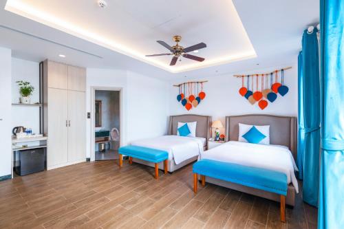 Roma Hotel Phu Quoc - Free Airport Shuttle & Sunset Town Tourにあるベッド