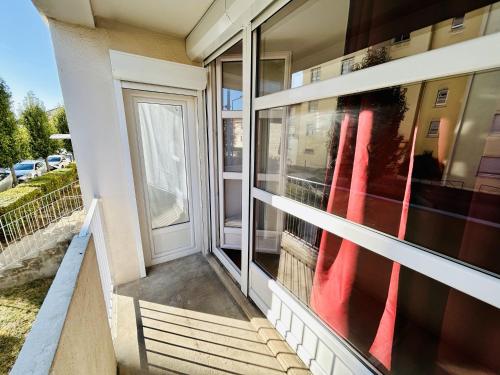 Μπαλκόνι ή βεράντα στο Le Cosy, Appartement Chaleureux 2 chambres