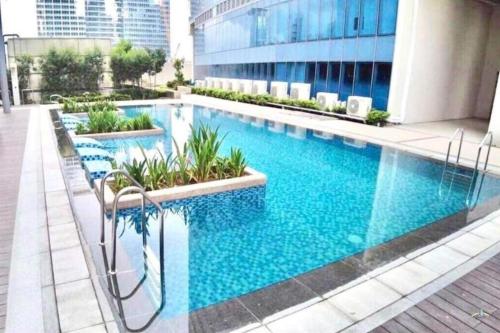 Gallery image of Cozy 1BR Apartment in Manila, BGC, with Balcony & Pool in Manila