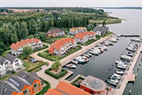 an aerial view of a marina with boats in the water at Hafendorf Haus 5_ Apartment 3 in Plau am See