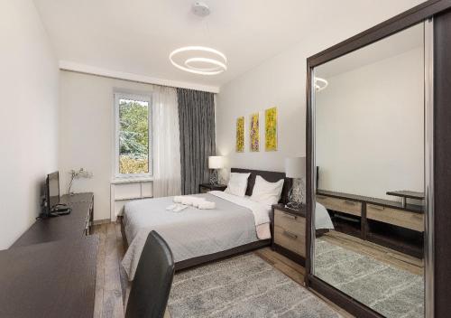 Кровать или кровати в номере HD New Apartment