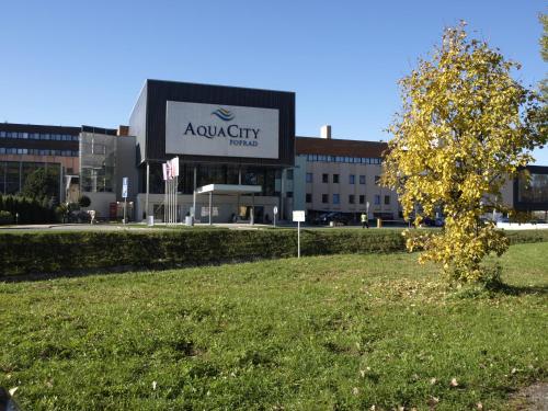 aania city sign in front of a building at Penzion Fantazia Poprad - Self check-in in Poprad