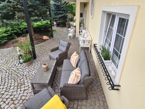 Гостиная зона в APARTAMENTY "LA VILLA" z klimatyzacją, ogrodem, parkingiem, blisko centrum