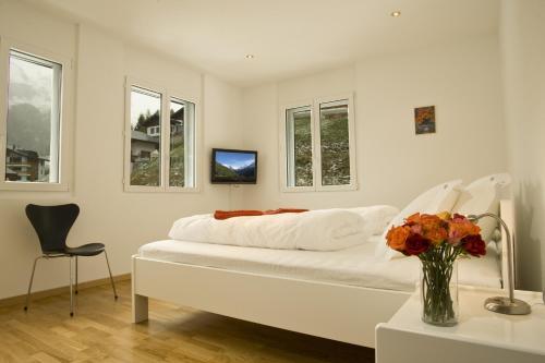 Postel nebo postele na pokoji v ubytování Apartments Residenz Iris