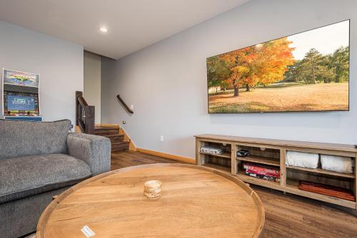 a living room with a couch and a table at Moon and Stars in McHenry
