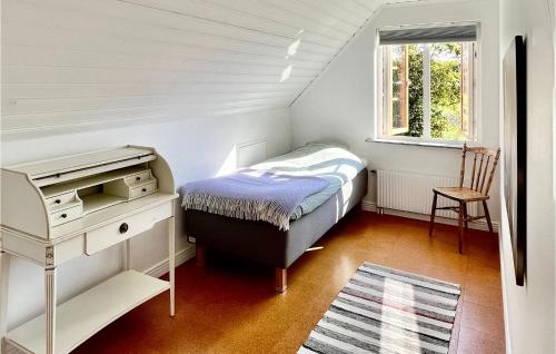 4 Bedroom Beautiful Home In Klippanにあるベッド