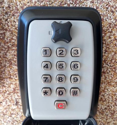 an iphone with the apple symbol on it at Melograno Rooms B&B in Brogliano