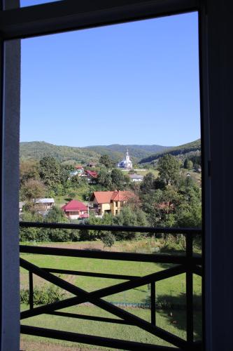 a view from the window of a house at RIVER SIDE in Polyana