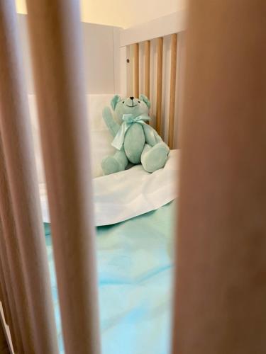 Postel nebo postele na pokoji v ubytování VERDEACQUA SUITE